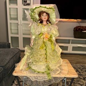 Golden Keepsake Vintage Porcelain Doll in Green dress